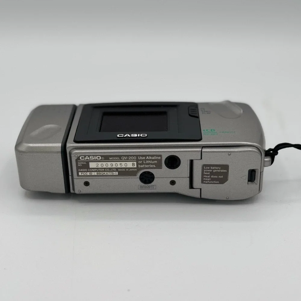 Casio QV-200 LCD Digital Camera Silver Vintage Rotating Lens QV200 Tested Works